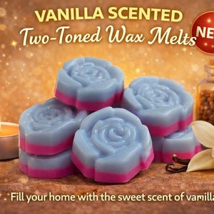 May include: Vanilla-scented, two-toned wax melts in the shape of roses, with blue and pink layers. A lit tea light, a vanilla flower, and a jar of vanilla beans are also visible. Text reads: "Fill your home with the sweet scent of vanilla!"
