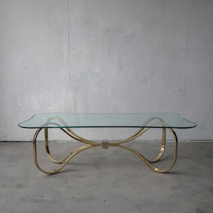 1980's Regency Brass and Glass Bow Tie Coffee Table image 1
