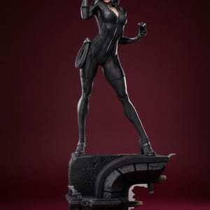 May include: A white ceramic mug with a black handle and the text "But First, Coffee" in a black, bold font. The mug is on a white surface. The mug is 10 cm tall.