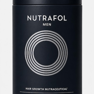 May include: A cylindrical, matte black container of Nutrafol Men hair growth nutraceutical dietary supplement. The label features the brand name in white, the word "MEN", and a silver concentric circle design. The container holds 120 capsules.