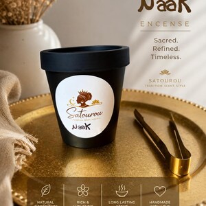 Loose Naak incense powder made from natural Senegalese aromatics, shown in a small mound on a neutral background with its fine earthy texture visible.