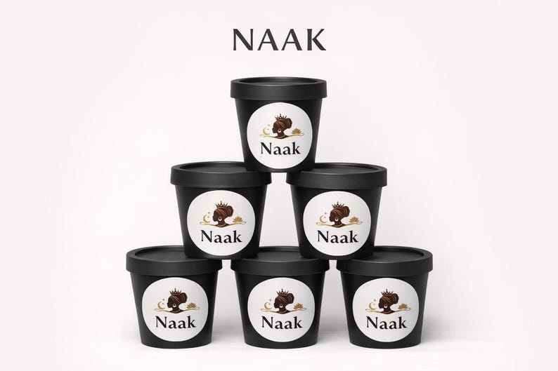 Loose Naak incense powder made from natural Senegalese aromatics, shown in a small mound on a neutral background with its fine earthy texture visible.