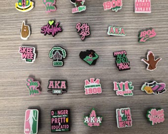 Llaveros de cocodrilo rosas y verdes