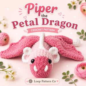 May include: A crochet dragon toy named Piper the Petal Dragon, featuring a pink and white yarn body with large wings, black eyes, and white horns. The text reads Piper the Petal Dragon CROCHET PATTERN and Loop Pattern Co. The design is soft and textured.
