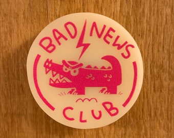 Bad news club acrylic pin - alligator