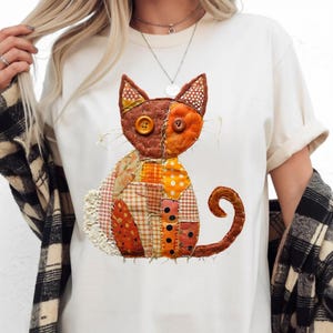 T-shirt con gatto arancione patchwork / Illustrazione di gatto trapuntato in stile casalingo, maglietta autunnale retrò