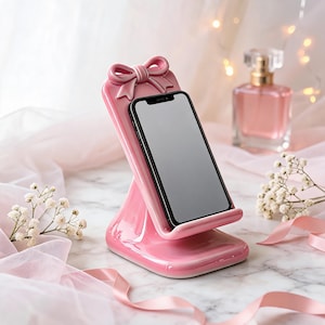 Arquivo STL do Suporte para Celular Coquette Bow | Suporte de Mesa Feminino para Celular e Organizador de Maquiagem para Impressão 3D