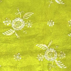 May include: A vibrant lime green fabric featuring a repeating pattern of embroidered floral motifs. Each flower is crafted with silver-toned sequins and metallic thread, accented by small, delicate leaf-like sprigs and scattered circular bead clusters.