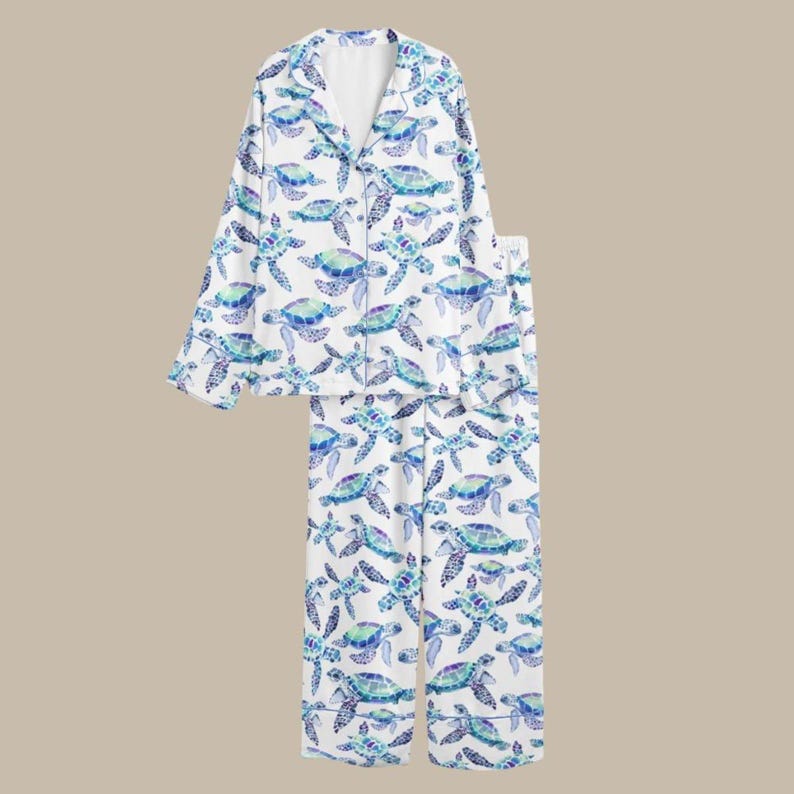 May include: A set of three ceramic mugs with a speckled, matte finish. The mugs are in shades of cream, light gray, and dark gray. Each mug has a simple, minimalist design and a rounded handle. Perfect for coffee or tea.