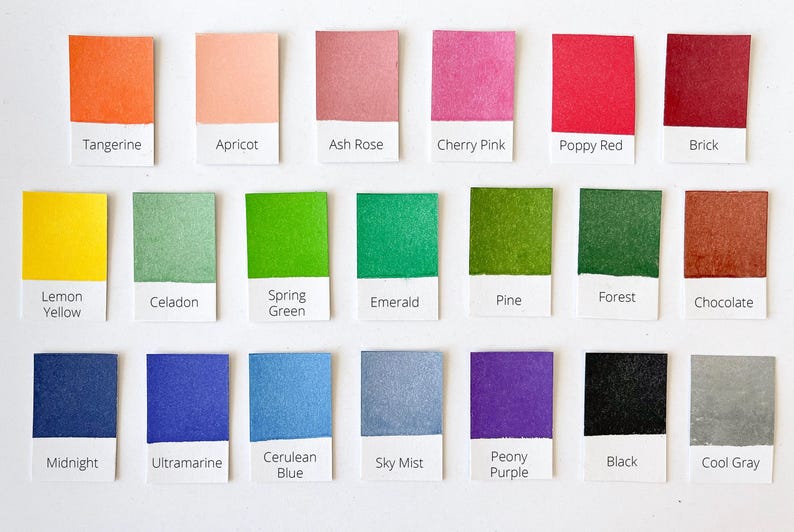 May include: A color chart with 18 different paint colors, each color is labeled with its name. The colors include Tangerine, Apricot, Ash Rose, Cherry Pink, Poppy Red, Brick, Lemon Yellow, Celadon, Spring Green, Emerald, Pine, Forest, Chocolate, Midnight, Ultramarine, Cerulean Blue, Sky Mist, Peony Purple, Black, and Cool Gray.