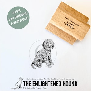 May include: A black and white illustration of a dog sitting. The illustration is on a white background with the text "The Enlightened Hound" and "Prints for the Love of Dogs" below the image. The text "Over 120 Breeds Available" is in a circle in the top left corner of the image. A wooden stamp with the text "The English Stamp Company" is in the top right corner of the image.