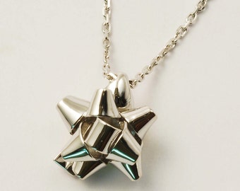 18 k starred node necklace