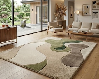 Tapis abstrait en laine tuftée à la main, vert sauge et beige, style bohème, pour salon.