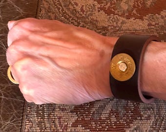 Genuine leather bracelet with shotgun shell concho