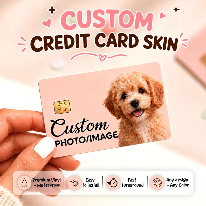 May include: A custom credit card skin with a photo of a fluffy, light brown dog. The card is pink with the words "CUSTOM CREDIT CARD SKIN" at the top. The card also says "Custom PHOTO/IMAGE". Features include waterproof, easy to install, fast turnaround, and any design or color.
