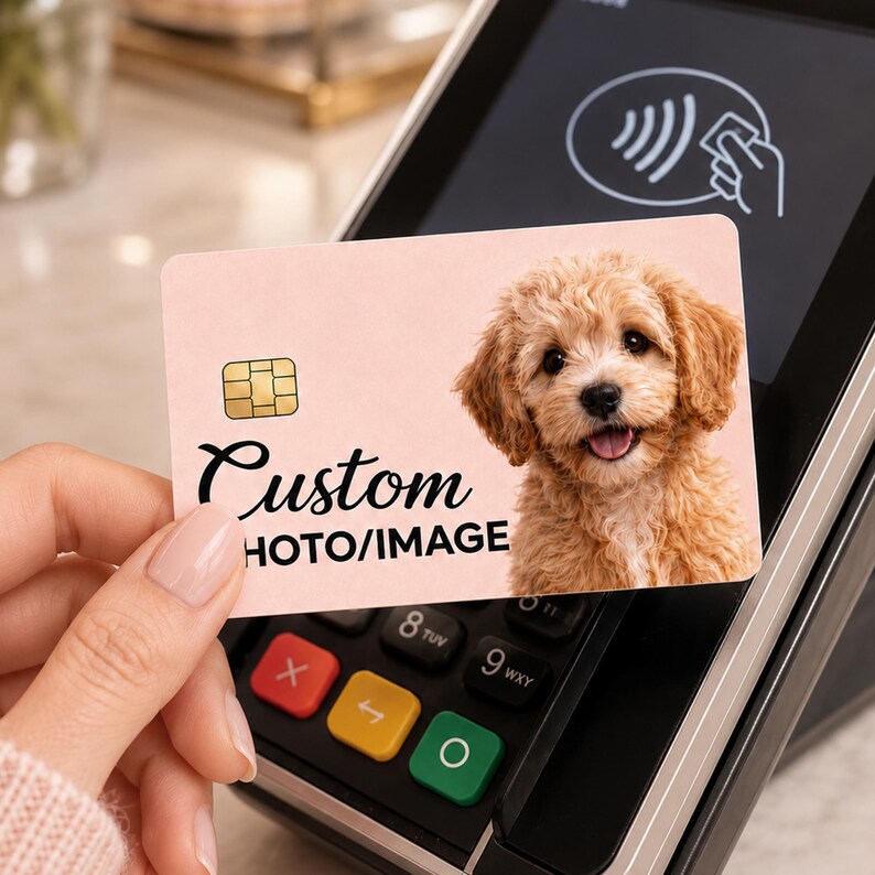 May include: A custom pink card with a smiling puppy image and the words "Custom PHOTO/IMAGE". The card has a gold chip and is being used with a contactless payment terminal.