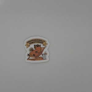 Professionally Unbothered Capybara Sticker