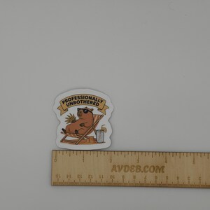 Professionally Unbothered Capybara Sticker