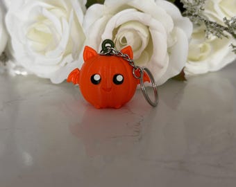 3D-geprinte pompoen-vleermuis sleutelhanger – handgeschilderd Halloween-accessoire