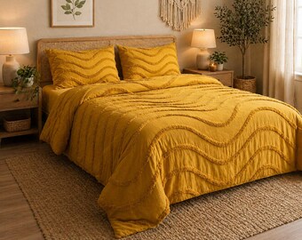 Funda nórdica bohemia de algodón con mechones en amarillo mostaza y funda de almohada.