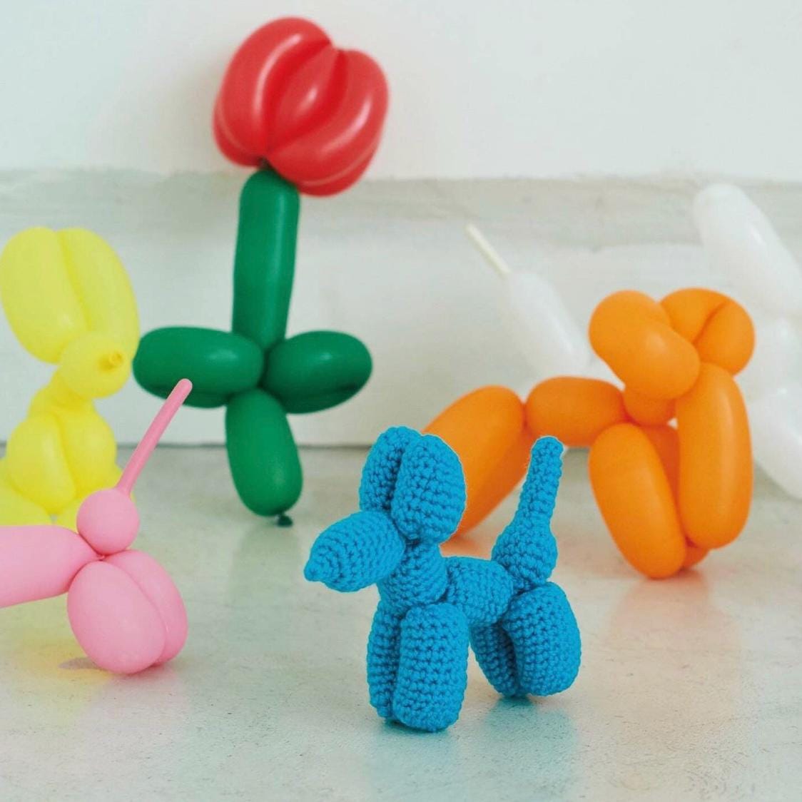 30 Balloon Dog Crochet Patterns for Adorable Toys, Decor, and Gifts 16 Blue Balloon Dog Crochet Pattern with Symbol Drawings