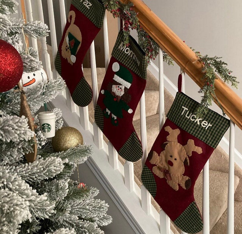 Christmas stocking with a girl elf hand-stitched to the front. Multiple hair colors to choose from. This Elf Christmas stocking is made of high quality felt, lined, personalized and hangs beautifully. Christmas stocking to treasure for years to come.