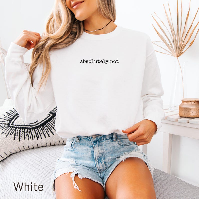 White crewneck sweatshirt with "absolutely not" printed on the chest.