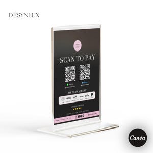 Może przedstawiać: Pionowy, przezroczysty stojak na znaki z akrylu z czarną wkładką z napisem SCAN TO PAY, dwoma kodami QR oraz ikonami Cash App, Venmo, Apple Pay i innych metod płatności. Znak zawiera prośbę o wystawienie pięciogwiazdkowej recenzji oraz ikony mediów społecznościowych.