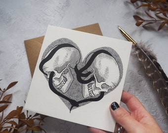 Tarjeta de felicitación con el amor entrelazado: tarjeta romántica de aniversario