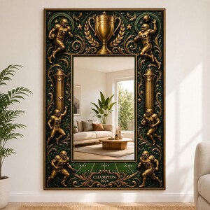 May include: A rectangular wall mirror featuring an ornate, dark green and gold frame decorated with relief sculptures of football players in action, decorative columns, and a central trophy. The bottom border displays the text CHAMPION 2024.