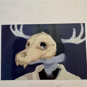 May include: Illustration of a creature with a skull-like head and antlers against a dark blue background. The skull is beige with visible teeth and large eyes. The antlers are white, and the creature appears to be wearing a white coat.