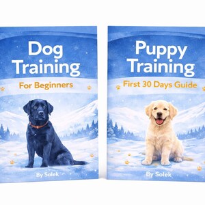 Może przedstawiać: Dwie książki z niebieskimi okładkami. Jedna zatytułowana "Dog Training For Beginners" z czarnym labradorem. Druga to "Puppy Training First 30 Days Guide" ze szczeniakiem golden retrievera. Oba ze scenami gór w śniegu.