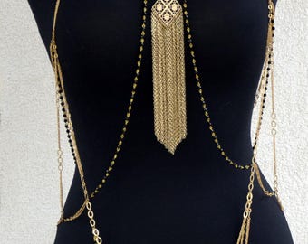 Cascading gold chains and a soft tassel body jewelry. Special occasion over a dress or casual over jeans and top.