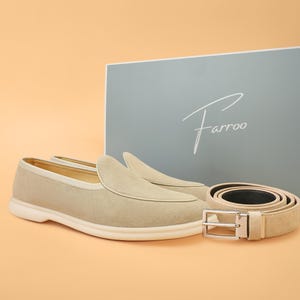 Matching suede loafers and belt set for men, coordinated outfit style.
