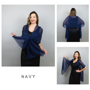 May include: A navy blue chiffon shawl, draped over a black dress. The lightweight shawl is tied at the front. The word "NAVY" is printed in white at the bottom of the image. The image shows the shawl from multiple angles, including the back.