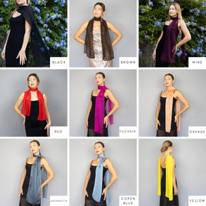 May include: A collection of sheer scarves in various colors, including black, brown, wine, red, fuchsia, orange, anthracite, copen blue, and yellow. Each scarf is draped over a black dress.