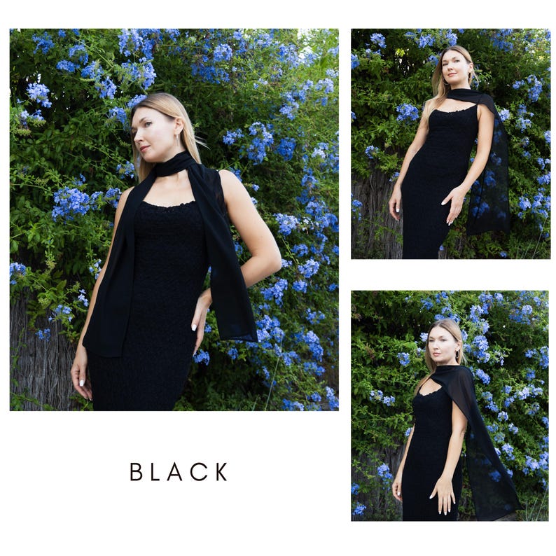 May include: A black dress with a matching scarf and cape. The dress has a textured pattern and a keyhole neckline. The word "BLACK" is displayed in white text at the bottom of the image. The background features blue flowers.