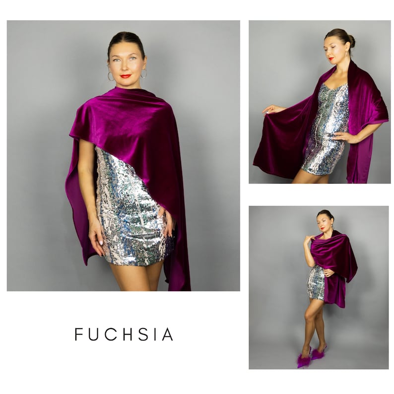 May include: A fuchsia-colored velvet shawl draped over a silver sequined dress. The image shows the shawl in multiple poses, highlighting its flowing design. The word "FUCHSIA" is printed in white at the bottom of the image.