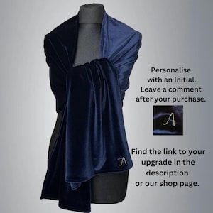 May include: A navy blue velvet shawl draped over a mannequin. The shawl is personalized with an initial. Text on the image reads: "Personalise with an Initial. Leave a comment after your purchase. Find the link to your upgrade in the description or our shop page."