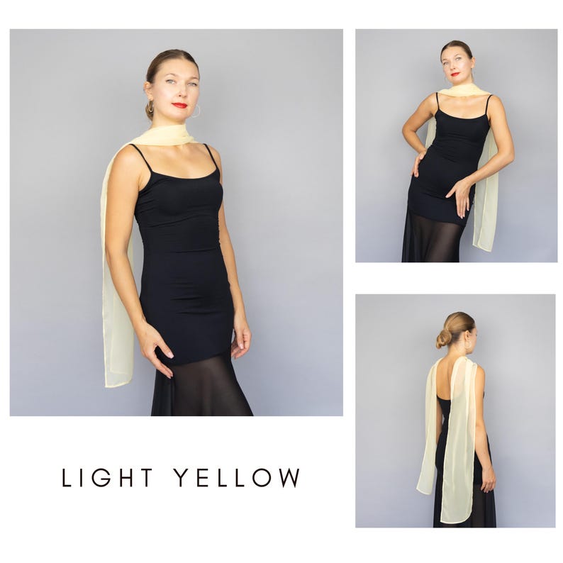 May include: A light yellow scarf draped over a black dress. The scarf is rectangular and appears to be made of a lightweight fabric. The text "LIGHT YELLOW" is at the bottom of the image.