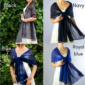 May include: Four different colors of sheer chiffon scarves. The colors are black, navy, blue, and royal blue. The scarves are draped around the shoulders of models.