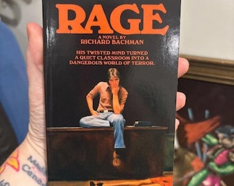 Ira, de Stephen King, escrito bajo el seudónimo de Richard Bachman, edición de bolsillo, nuevo ejemplar, thriller psicológico raro y descatalogado.