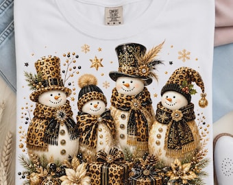 Comfort ColorsLeopard Snowman Shirt, Luxury Christmas Snowman Shirt, Black Gold Holiday Tee, Winter Christmas Graphic Shirt, Elegant Snowman