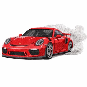 May include: Embroidered red sports car with black accents and silver wheels. The car is depicted with a cloud of white smoke, suggesting speed and motion. The design is detailed and appears to be a patch or applique.