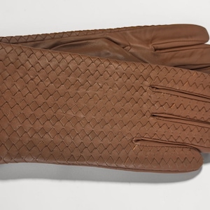 woven leather gloves with intrecciato texture, genuine sheepskin lining and smooth palm.