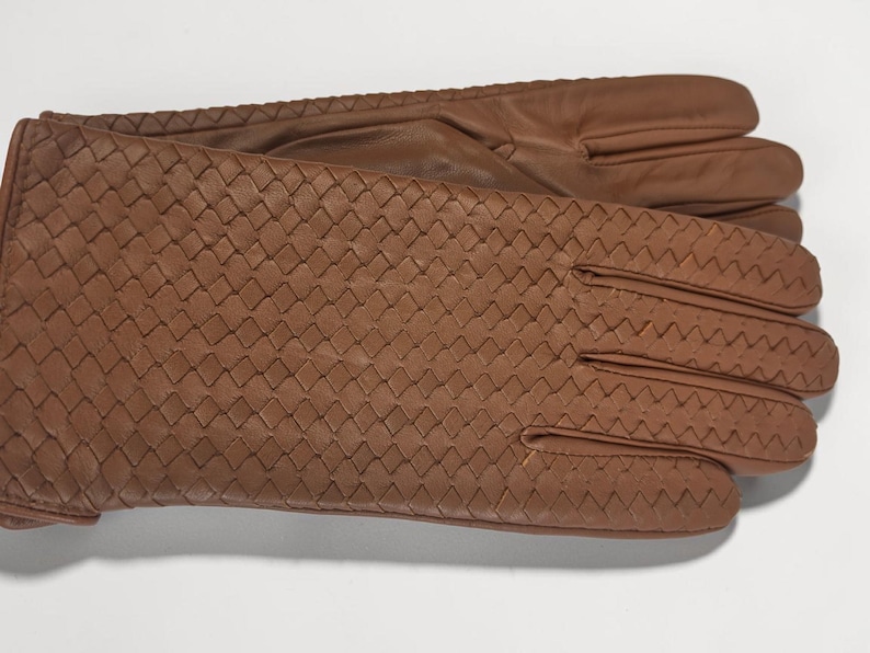 woven leather gloves with intrecciato texture, genuine sheepskin lining and smooth palm.