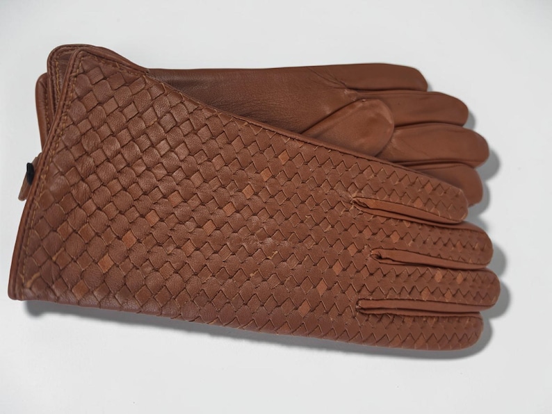 woven leather gloves with intrecciato texture, genuine sheepskin lining and smooth palm.