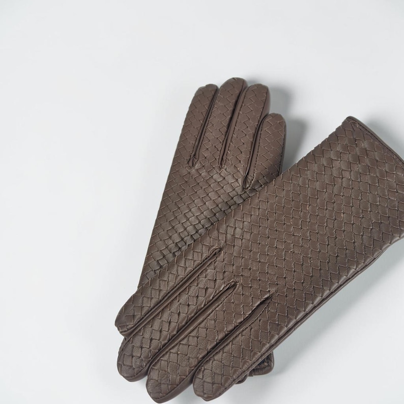 woven leather gloves with intrecciato texture, genuine sheepskin lining and smooth palm.