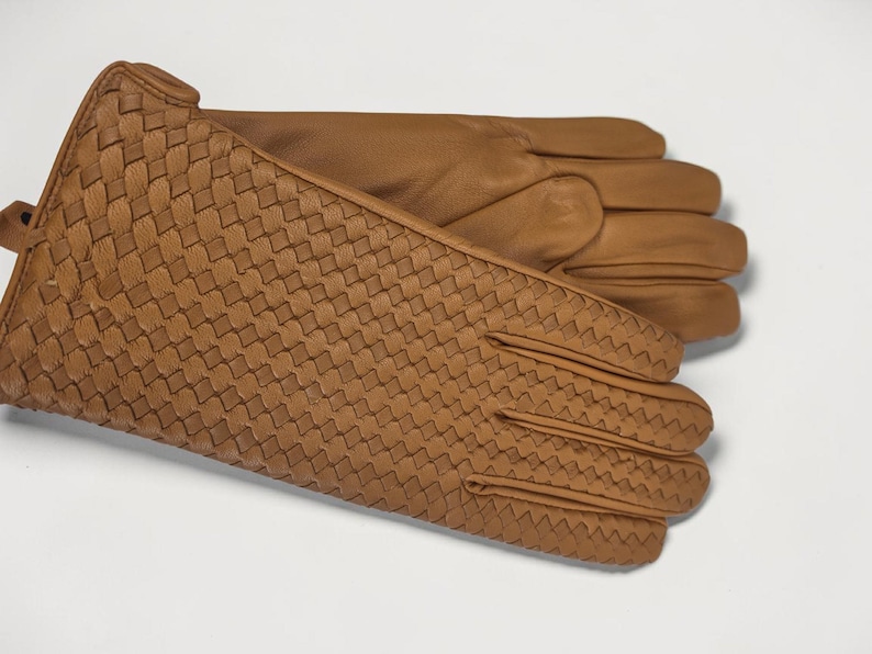 woven leather gloves with intrecciato texture, genuine sheepskin lining and smooth palm.