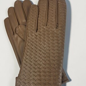 woven leather gloves with intrecciato texture, genuine sheepskin lining and smooth palm.